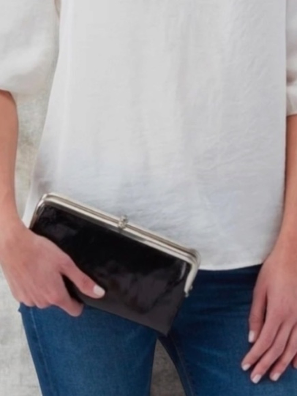 HOBO International Black Leather Lauren Clutch with Silver Hardware.